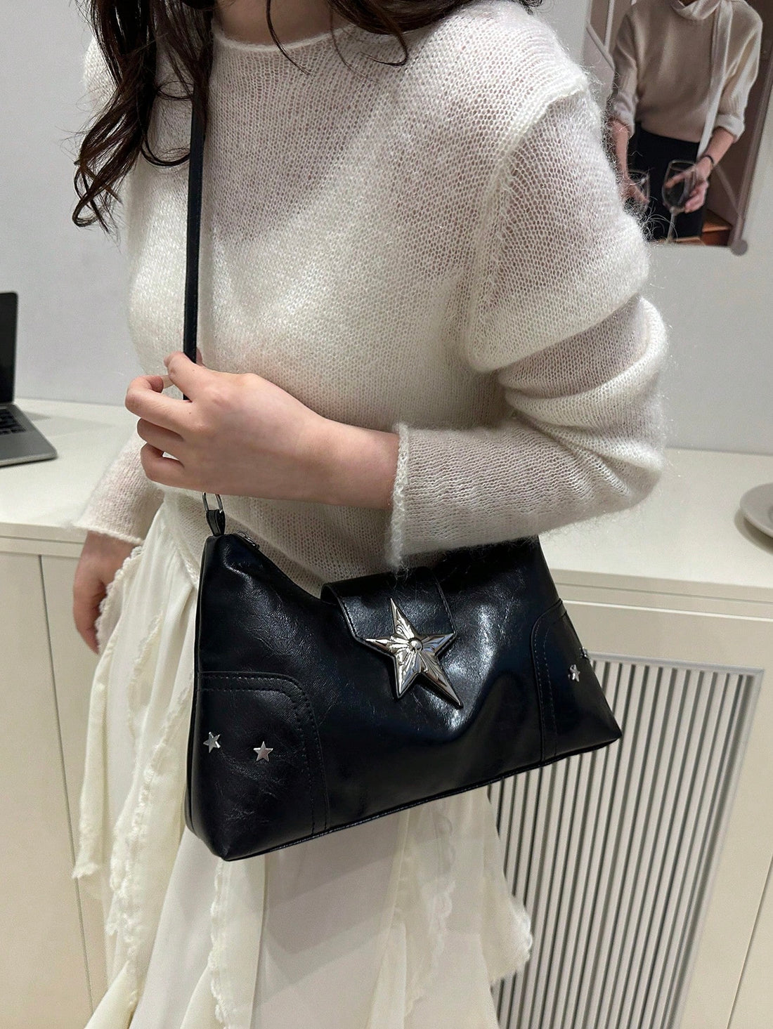 Add a pop of charm to your everyday look with this playful shoulder handbag adorned with shiny rivet star details. Designed for women on the go, it offers ample space to stash all your essentials while keeping you stylish and lighthearted. Perfect for commuters who love combining function with a touch of fun flair!