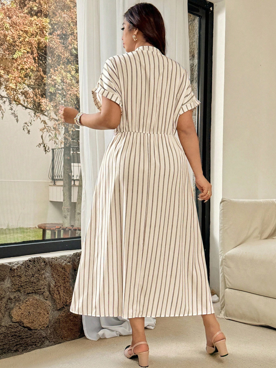 Step out in style and comfort with our Plus Size Striped Midi Dress—your new go-to for sunny days! This playful dress blends breezy casual vibes with a flattering fit, making it perfect for commuting or relaxing on vacation. The cheerful stripes and midi length add a fun twist to your summer wardrobe, keeping you cool and confident wherever your adventure takes you.