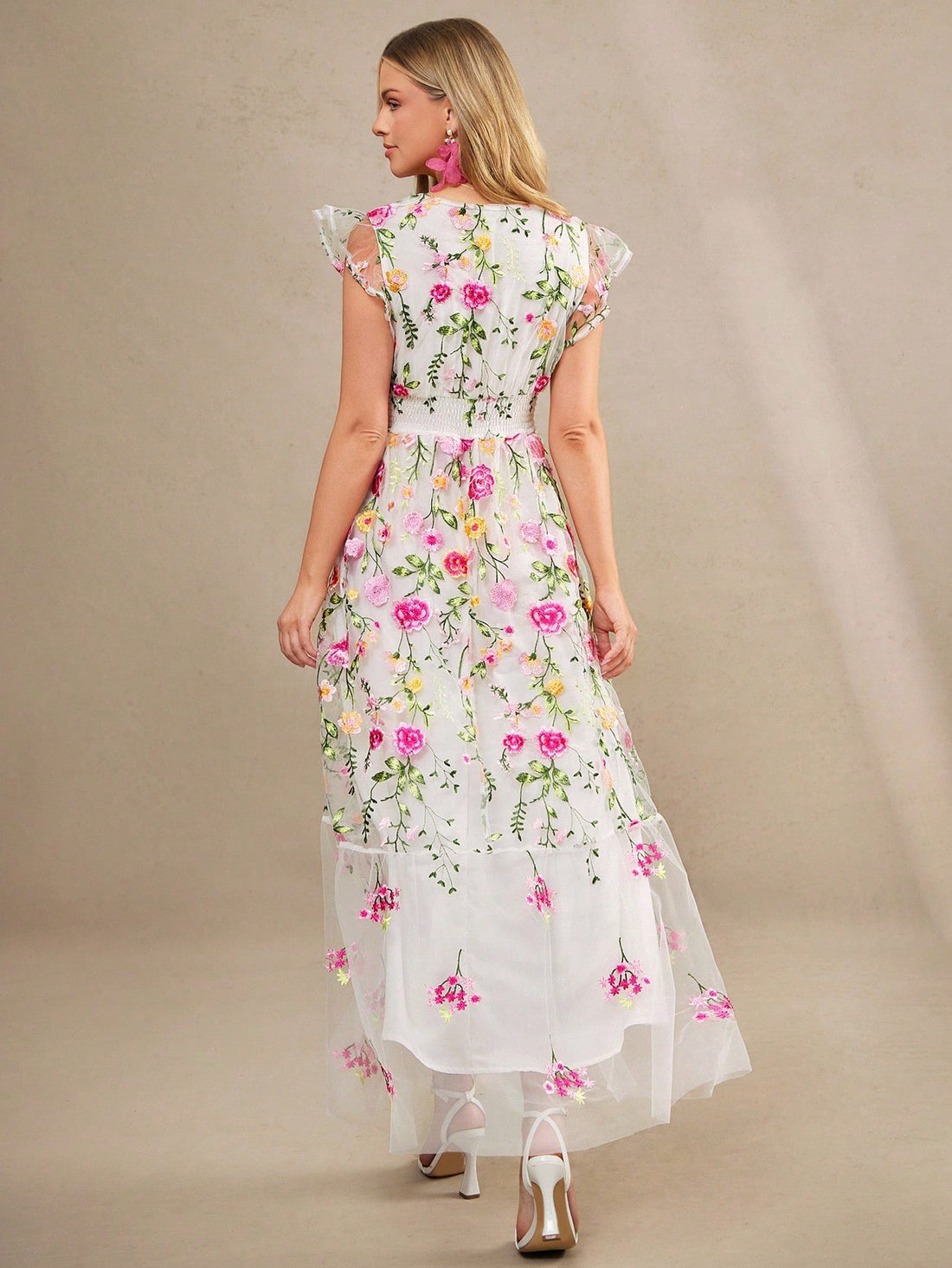 Step into spring and summer with flair in this Elegant A-Line Dress featuring charming shirred ruffle sleeves. Its flowing silhouette offers comfort for all-day wear, while the playful ruffles add a touch of whimsy to your daily look. Perfect for breezy days and sunny outings, this dress effortlessly combines style and ease for your warm-weather wardrobe.