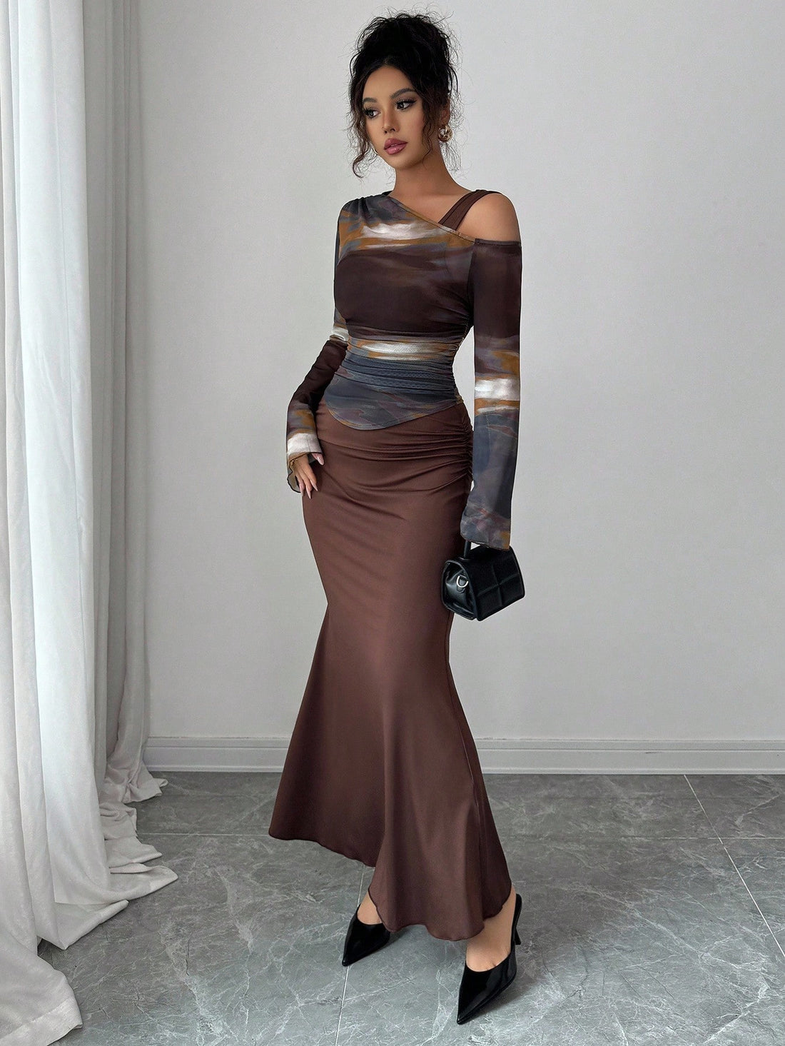 Turn heads this season with our stunning 2-piece knitted mesh bodycon skirt set. The fitted silhouette hugs your curves in all the right ways, while the sheer mesh detailing adds an edgy, modern twist. Layer the coordinating pieces for a bold statement look, or mix and match with your favorite basics. Crafted from quality knit fabric that moves with you, this set delivers comfort without compromising on style. Your go-to pick for nights out, date nights, or whenever you want to feel absolutely fabulous.