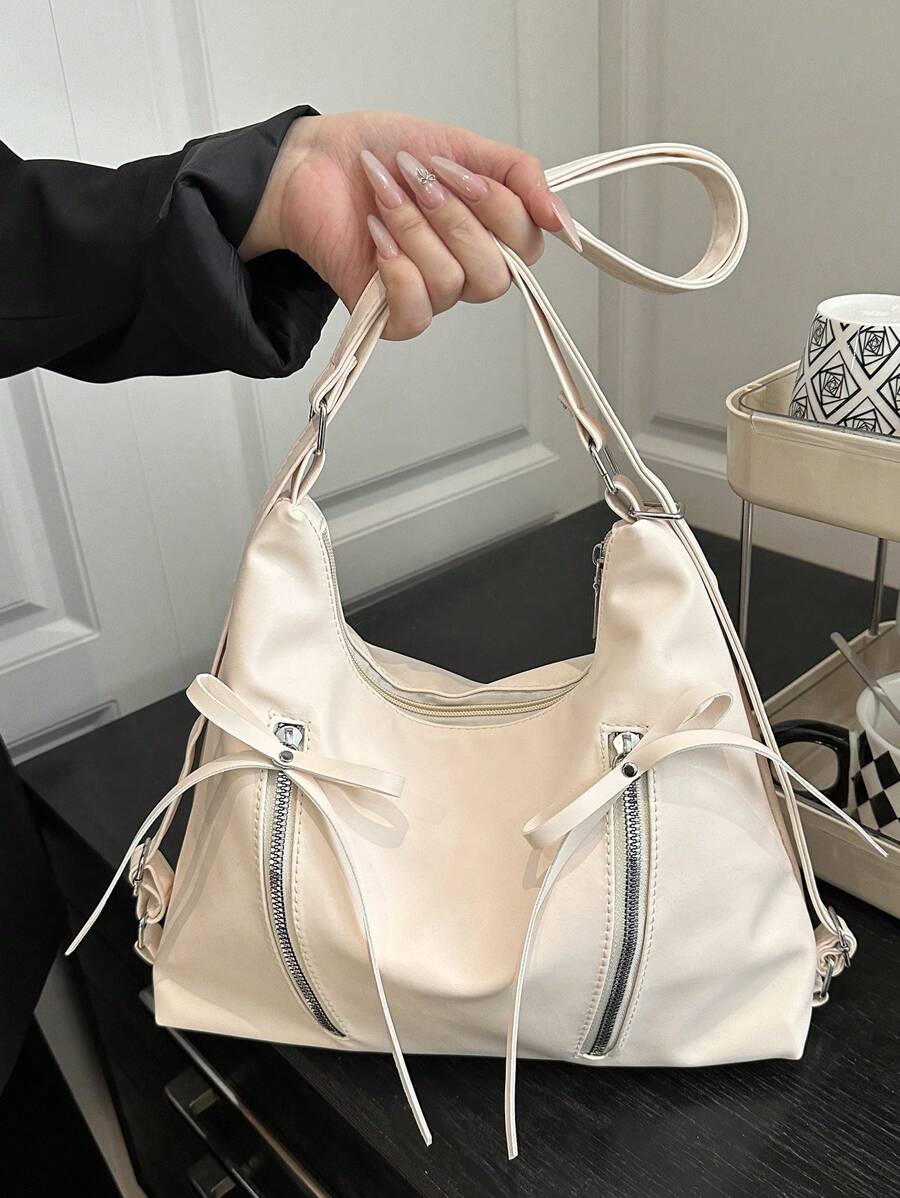 This Chic Bow Decor Backpack combines playful style with practicality, featuring a roomy design perfect for travel or a day out shopping. Its Korean-inspired charm adds a trendy twist to your outfit, while the large capacity ensures you can carry all your essentials with ease. Whether you're exploring the city or running errands, this tote backpack keeps you looking cute and feeling organized.