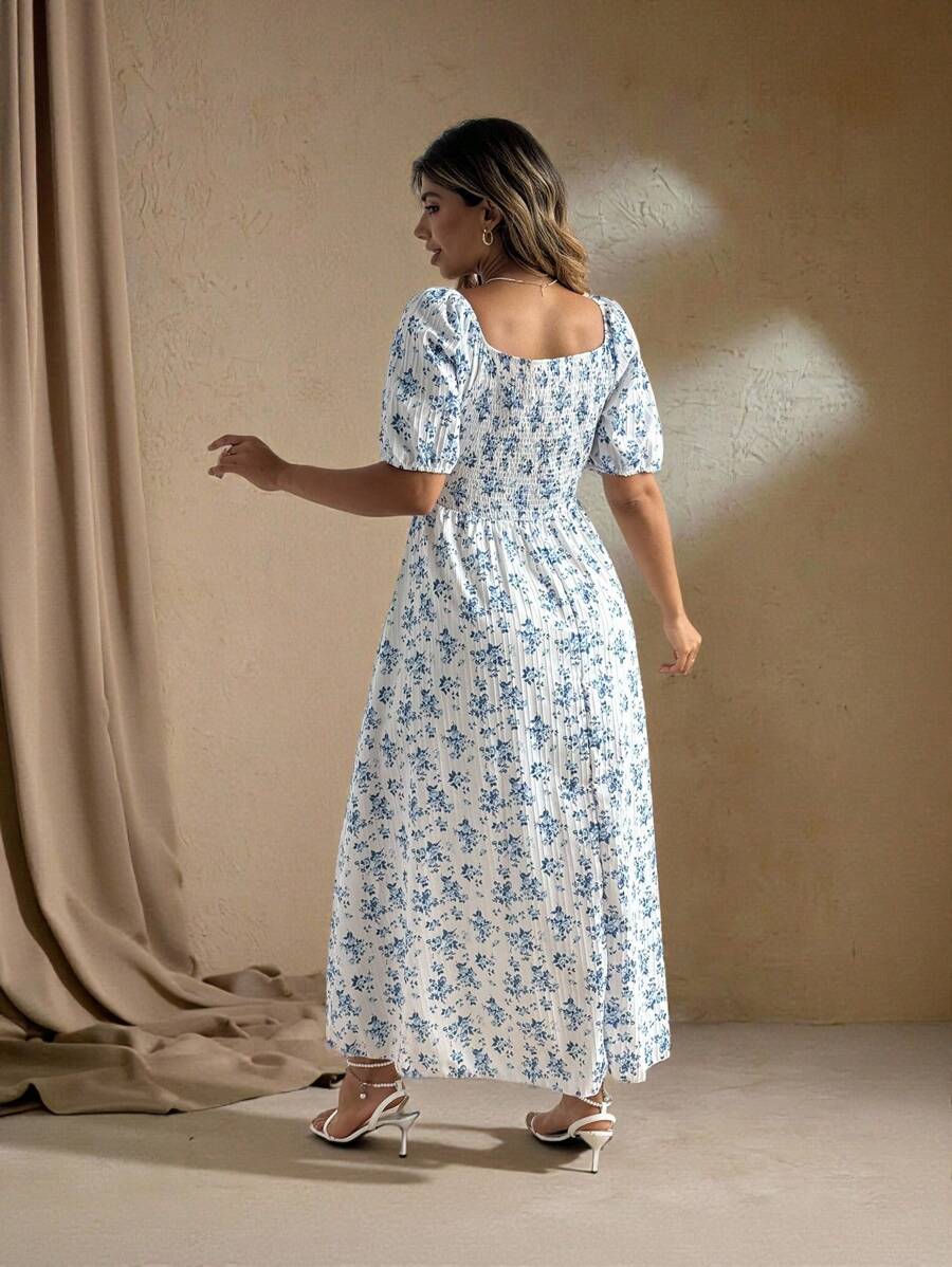 Step into playful charm with this Plus Size Ditsy Floral High Slit Casual Dress. Featuring a flirty high slit and a delicate floral print, it effortlessly mixes comfort with a touch of sass. Perfect for brunch dates or sunny strolls, this dress lets you show off your style and spin with confidence wherever you go.