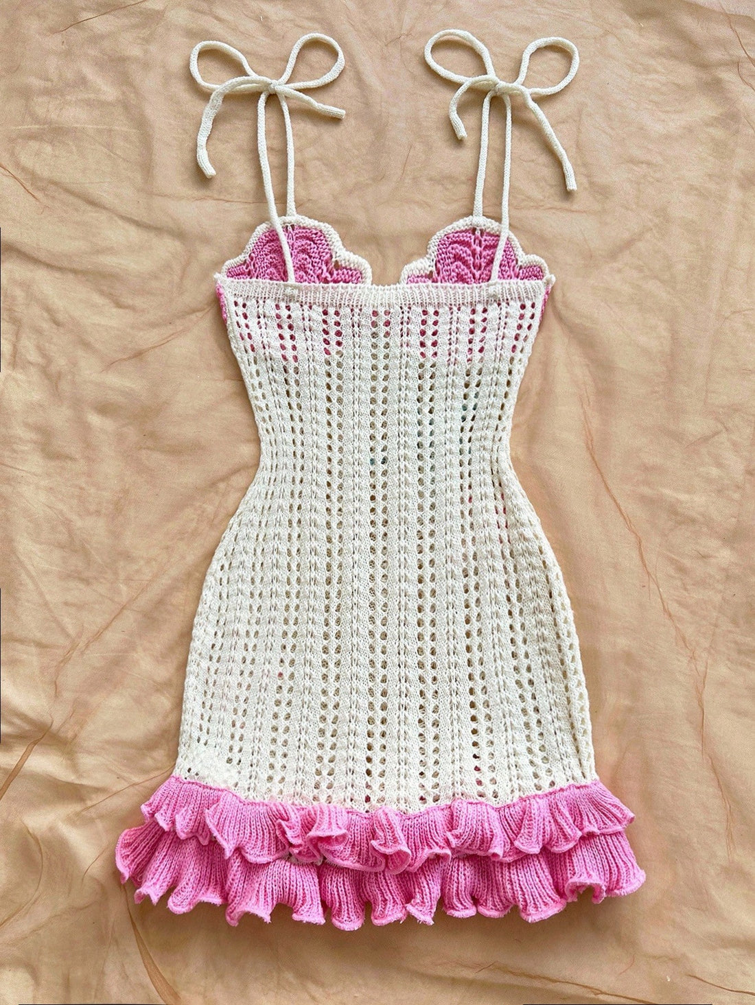 Turn heads wherever you go in this Chic Peach Starfish Halter Knit Dress. Featuring a playful halter neckline and a flirty double ruffle hem, it’s perfect for beach days, weddings, or your next vacation getaway. Soft knit fabric ensures comfort while the peach starfish pattern adds a fun, summery vibe. Get ready to feel breezy and fabulous all day long!
