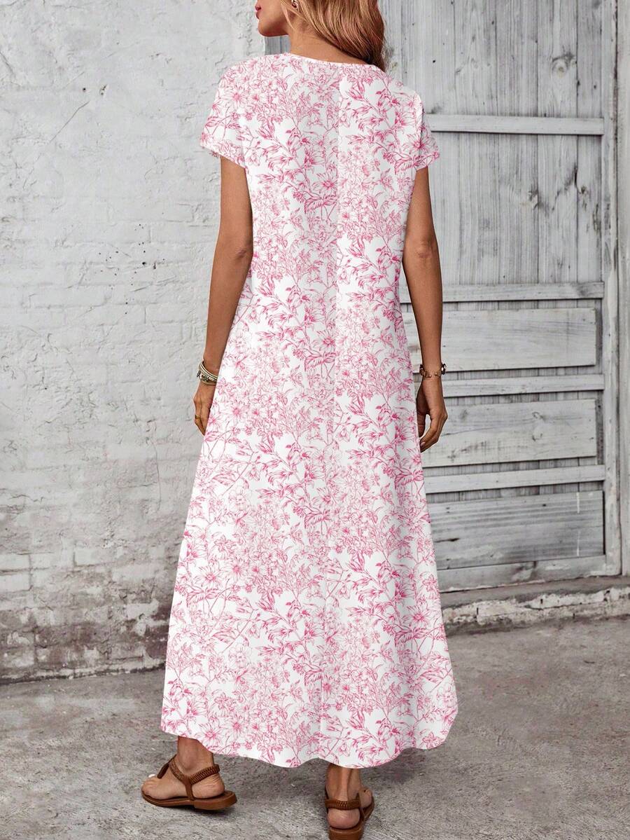 Front view of pink floral loose maxi dress with round neckline