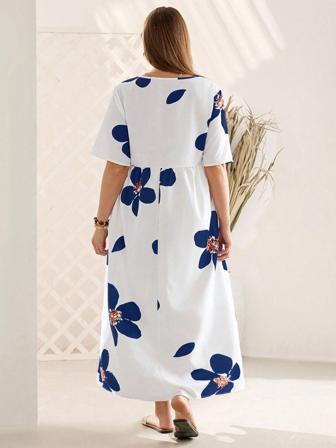 Step into sunshine and style with this vibrant plus size floral print long dress. Designed with comfy pockets and flowing fabric, it’s perfect for your spring and summer getaways. Embrace carefree days and breezy evenings while feeling fabulous and ready for any adventure!