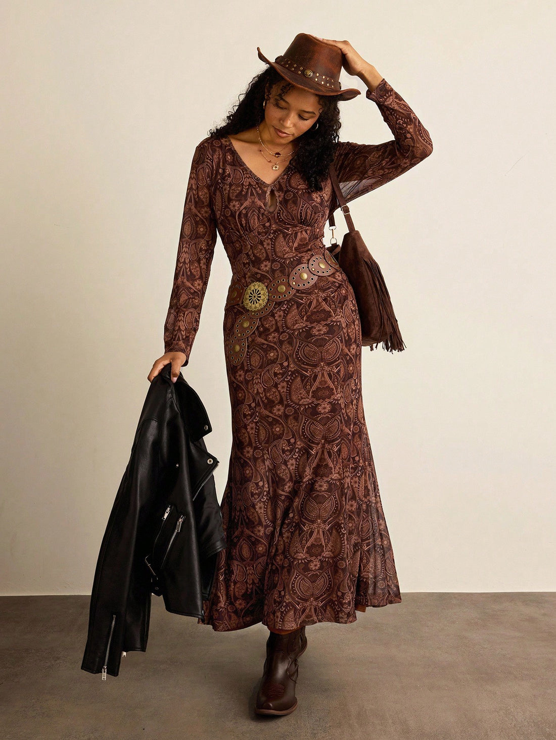 Embrace effortless elegance with this stunning plus-size maxi dress, featuring a romantic floral print that brings garden-inspired charm to your wardrobe. The flattering V-neckline and graceful fishtail hem create a silhouette that's both sophisticated and fun. Perfect for vacation getaways or cozy fall and winter gatherings, this versatile piece transitions seamlessly from day to night. Crafted for comfort and confidence, it's your go-to dress for making a fabulous statement wherever you roam.