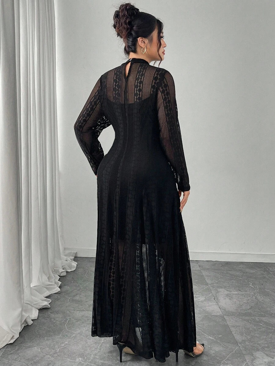 Turn heads in this Elegant Plus Size Black Long Sleeve Dress, designed with a flirty contrast mesh that adds just the right touch of allure. Perfect for romantic evenings or special occasions, its sleek silhouette flatters your curves while the mesh detail keeps things playful and chic. Dress up and let your confidence shine through every stunning moment.