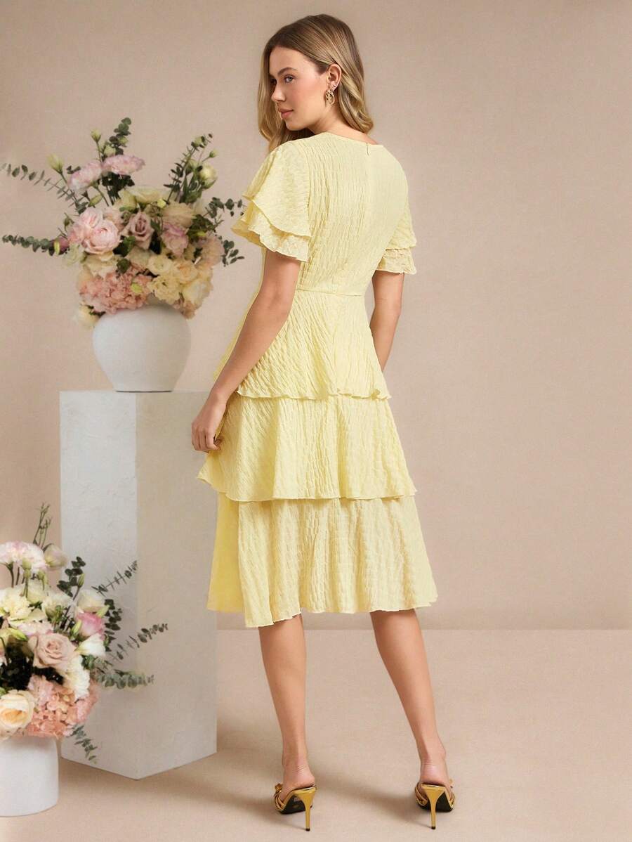 Step into charm with this Elegant Floral Ruffle Hem Dress! Featuring a flirty ruffle hem and delicate floral patterns, it’s your go-to for turning heads whether you're off to a wedding, a sunny brunch, or just daily adventures. Light, breezy, and effortlessly stylish—this dress adds a splash of joy to every occasion. Let your wardrobe bloom!