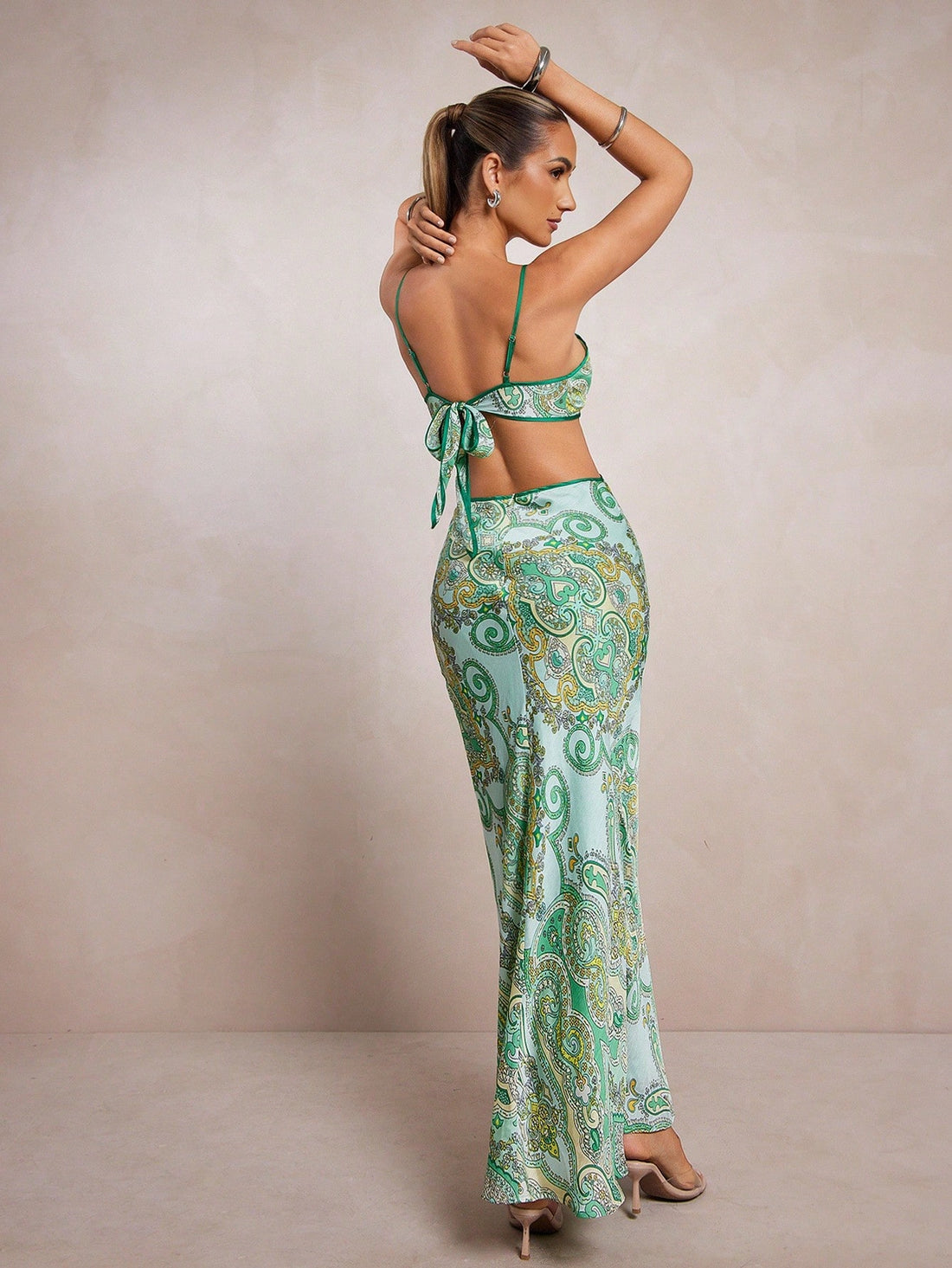 Step into effortless charm with this Elegant Women's Hollow-Out Maxi Shift Dress. Featuring delicate spaghetti straps and eye-catching hollow-out details, it’s perfect for turning heads at any occasion. Lightweight and breezy, this maxi dress combines comfort with style, making your look as playful as your spirit. Whether you’re out for a summer soirée or a casual day out, this dress keeps things fresh and flirty all day long.