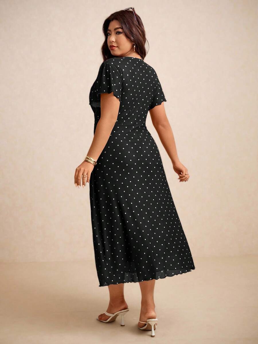 Step into timeless charm with this plus size vintage polka dot dress, designed to celebrate curves and confidence. Its romantic V-neck and breezy summer fabric make it perfect for teachers who want to mix a touch of retro elegance with everyday comfort. Whether in the classroom or on a sunny stroll, this dress adds playful grace to your day.