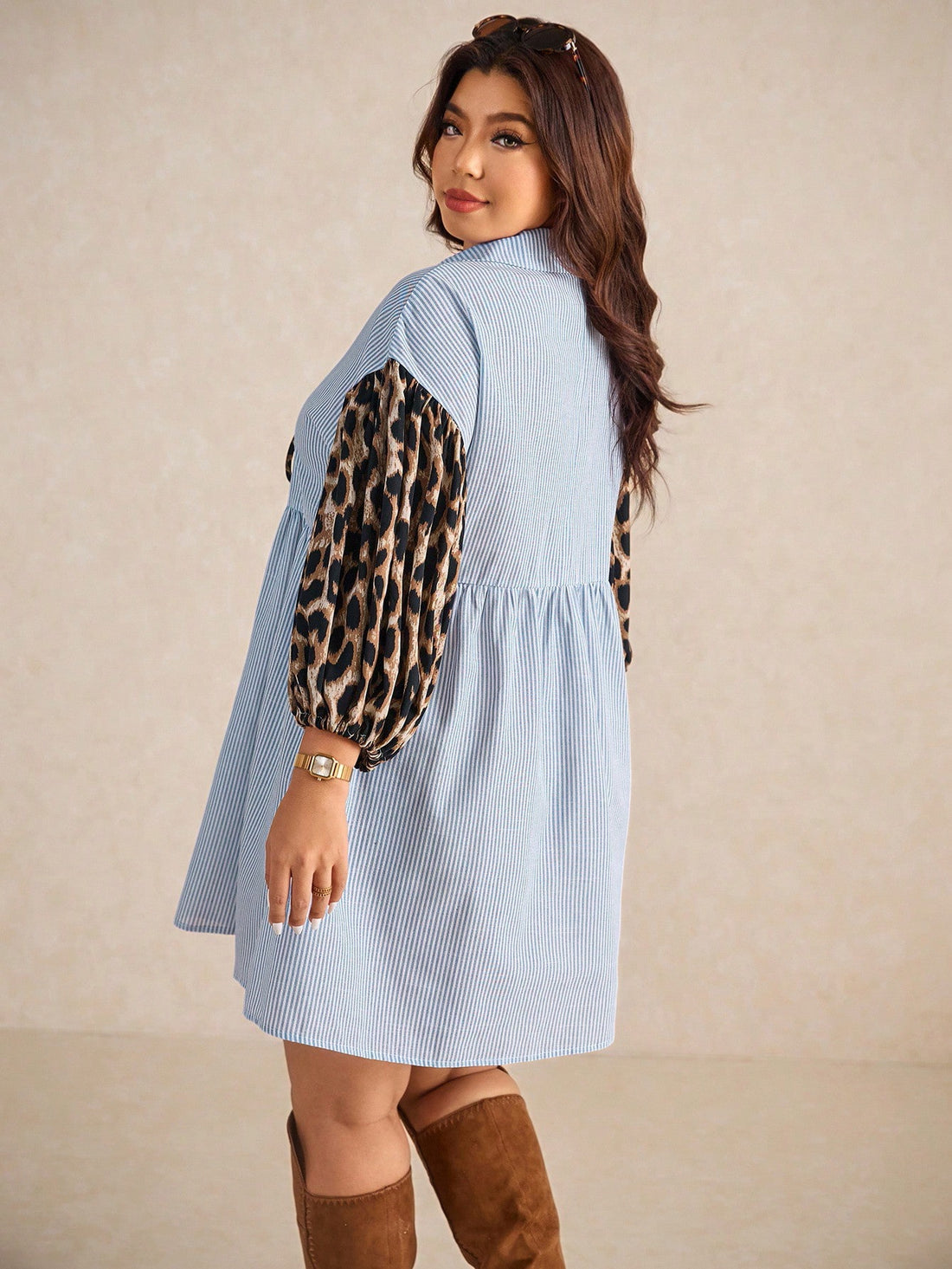Turn heads effortlessly in this chic plus size dress featuring a bold leopard print that adds a wild touch to your casual wardrobe. The lantern sleeves offer a fun, flirty silhouette while the front tie detail creates a flattering shape you'll love. Perfect for day-to-night wear, this dress combines comfort with playful style to keep you looking fabulous everywhere you go.
