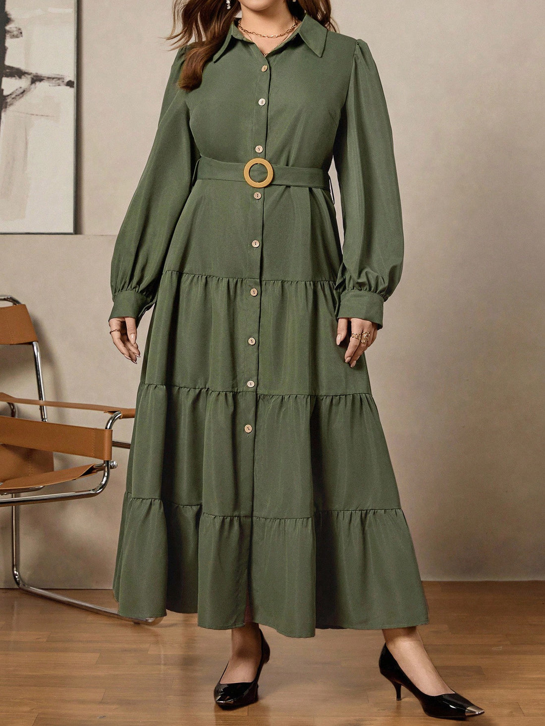 Step out in style and comfort with this playful plus size long sleeve shirt dress in a fresh green hue. The elegant ruffle hem adds a flirty twist, while its casual fit keeps you feeling relaxed all day. Perfect for fall outings or office days, it brings effortless chic to your wardrobe with a fun, feminine flair.