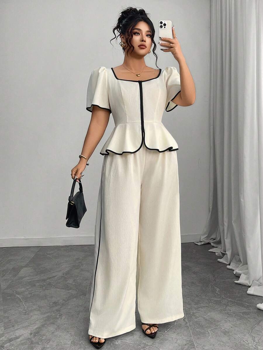 Elevate your spring and summer wardrobe with this sophisticated plus-size two-piece set. The blouse features a chic square neckline, puff sleeves, and elegant contrast binding that adds visual interest. A colorblock design in crisp white creates a modern, polished look perfect for the office or special occasions. 