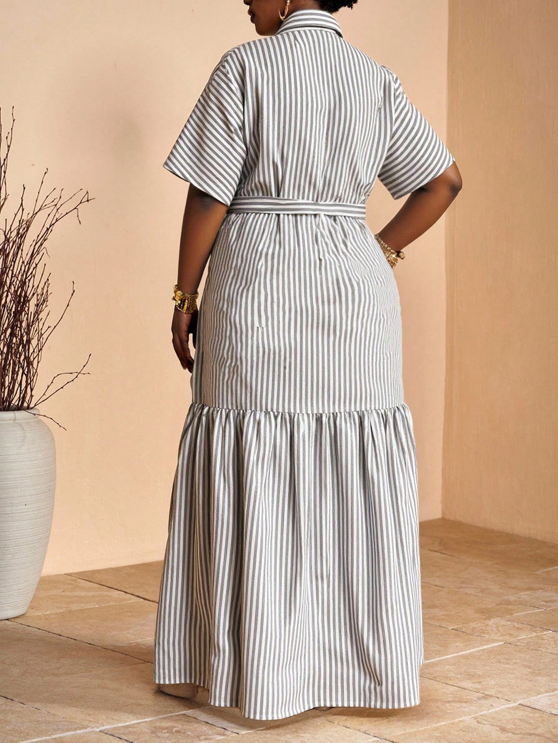 Step into sunny days with this playful gingham dress designed for effortless style and comfort. Featuring a flattering tie waist and handy pockets, it's perfect for everything from classroom charm to vacation vibes. Light and breezy, this dress brings a touch of fun elegance to your spring and summer wardrobe.