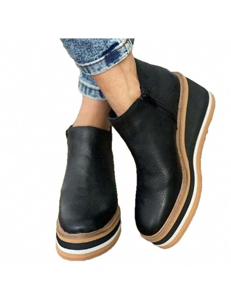 Step into cozy confidence with these stylish chunky heeled ankle boots designed especially for wider feet. Perfect for autumn and winter, their sturdy heels add height without sacrificing comfort. Whether you're chasing fall leaves or winter adventures, these boots keep you chic and comfy all season long.