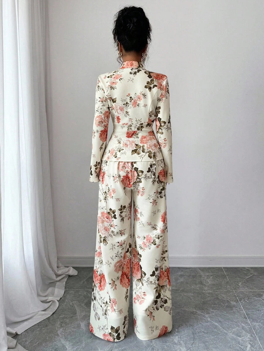 Bloom into style with this stunning floral print two-piece set that's ready to turn heads! The tailored blazer brings polished sophistication to any occasion, while the flowing wide-leg pants offer comfort without compromising on elegance. Perfect for spring strolls or autumn adventures, this ensemble effortlessly transitions from office to brunch to evening plans. The vibrant floral pattern adds a fresh, feminine touch that celebrates your personality. Mix, match, or wear together—this versatile duo is you