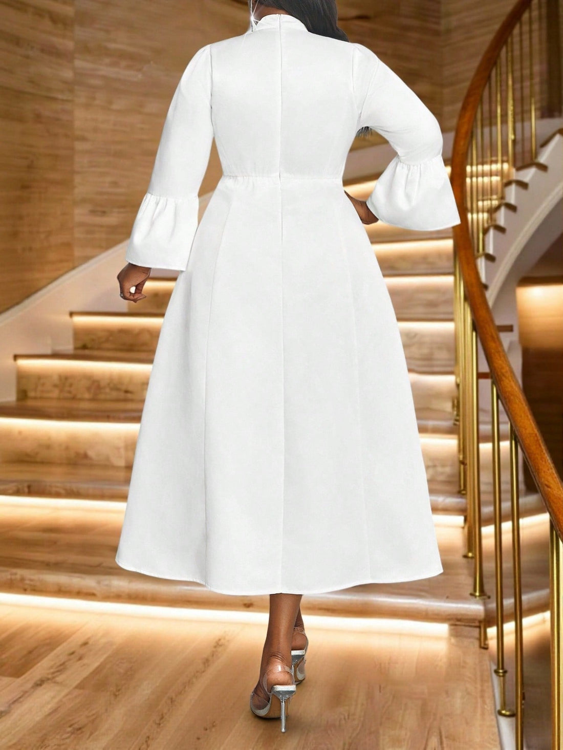 Elevate your wardrobe with this stunning white satin A-line dress that effortlessly transitions from boardroom to brunch. The graceful bishop sleeves add a touch of romance, while the midi length keeps things polished and sophisticated. Designed with plus-size comfort in mind, this versatile tunic flatters every figure and works beautifully for office meetings, weekend outings, or summer gatherings. Slip it on and feel the confidence that comes with looking absolutely fabulous.