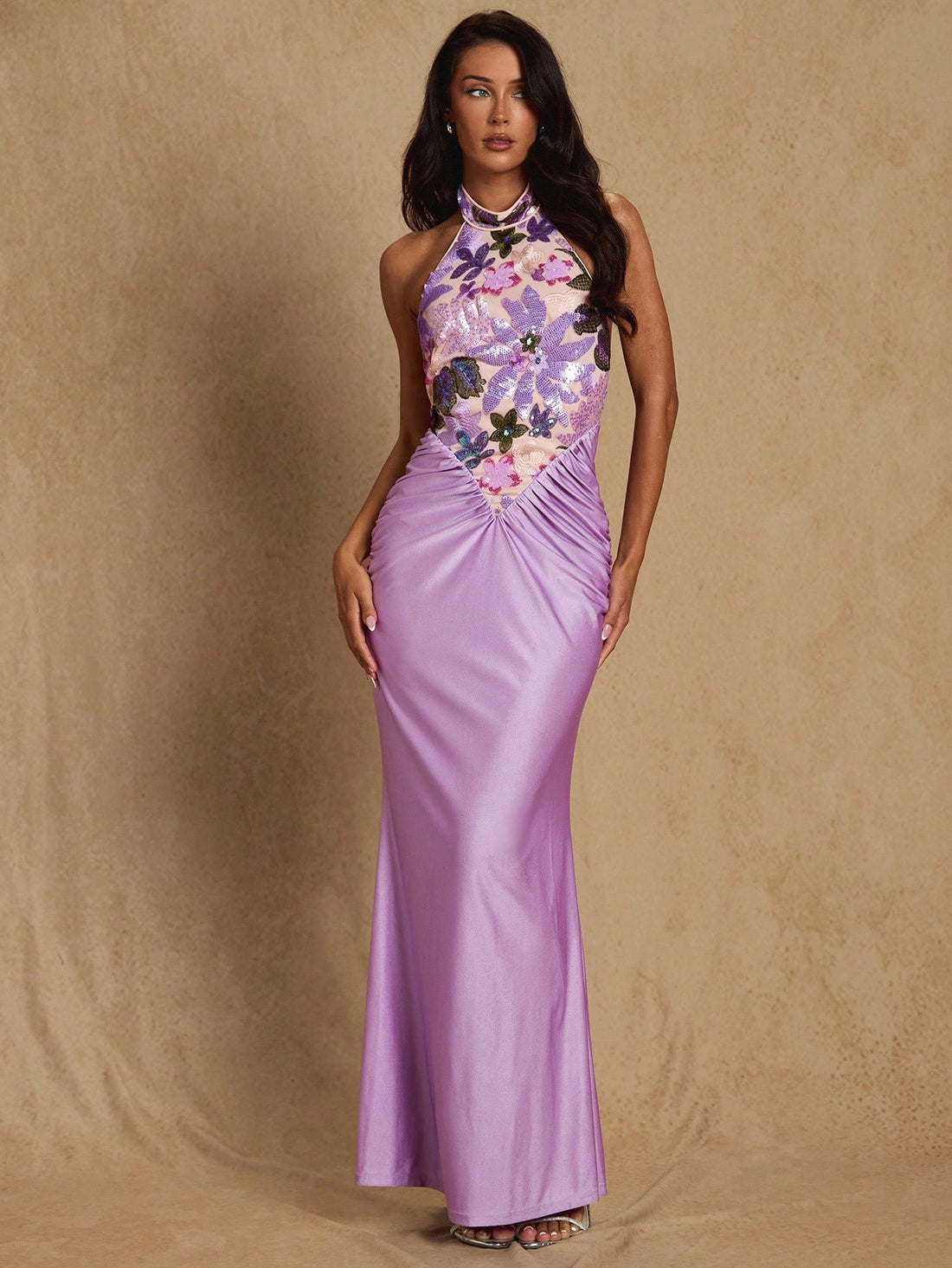 Turn heads at your next event in this stunning backless halter neck maxi dress! Shimmering sequins catch the light with every move, creating an irresistible sparkle that screams sophistication. The daring open back design pairs perfectly with the elegant halter neckline for a look that's equal parts bold and refined. Slip into this showstopper and watch the compliments roll in—because sometimes the best parties deserve the best dress.