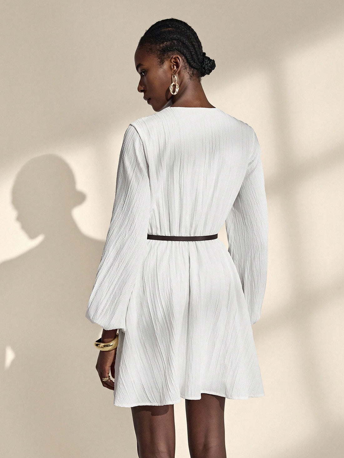 Twirl into romance with this enchanting white dress that whispers elegance at every turn. The dreamy lantern sleeves add a touch of whimsy and vintage charm, while the refined silhouette flatters effortlessly. Crafted with a French-inspired aesthetic, this versatile piece transitions seamlessly from crisp autumn days to breezy spring afternoons. Whether you're strolling through gardens or attending a special gathering, this dress captures that magical je ne sais quoi that makes you feel absolutely fabulous.