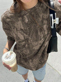 Image 4 - detail view of Trendy Women’s Casual Loose Camouflage Print Short Sleeve T-Shirt for Effortless Style