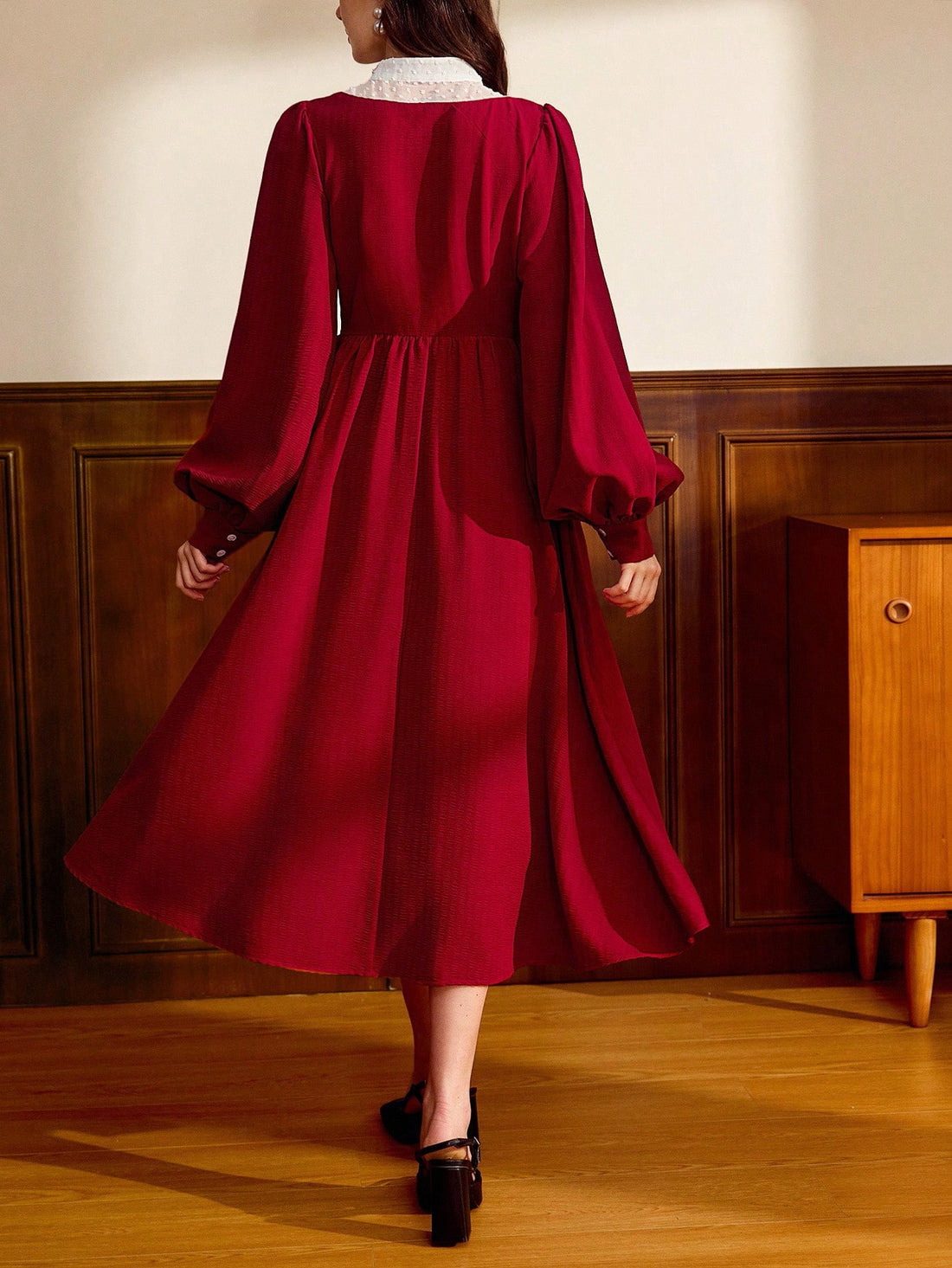 Step into timeless charm with this Elegant Vintage Wine Red Dress. Its fitted silhouette and long sleeves keep you cozy during autumn and winter while flaunting a classic retro vibe. A delicate brooch detail adds just the right touch of playful sophistication, making every outing feel like a stylish celebration.