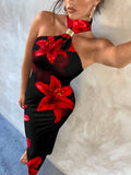 Black red floral maxi dress selfie with lily print asymmetric halter and gold connector
