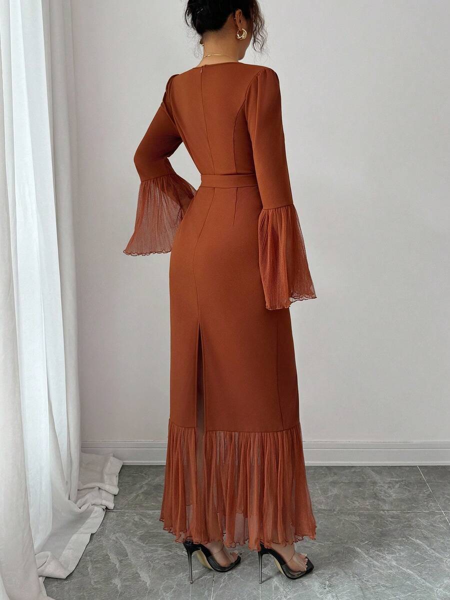 Turn heads at your next celebration in this stunning V-neck ruched mesh dress. The flattering ruching hugs your curves in all the right ways, while the sheer mesh fabric adds an effortless touch of elegance and movement. Perfect for spring and autumn parties, festivals, and nights out, this versatile piece transitions seamlessly from day to evening. The classic V-neckline frames your face beautifully, making it an instant go-to for any occasion where you want to feel confident and fabulous.