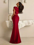 Burgundy two-piece evening set with gathered draping