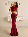 Burgundy cowl-neck crop top and mermaid maxi skirt