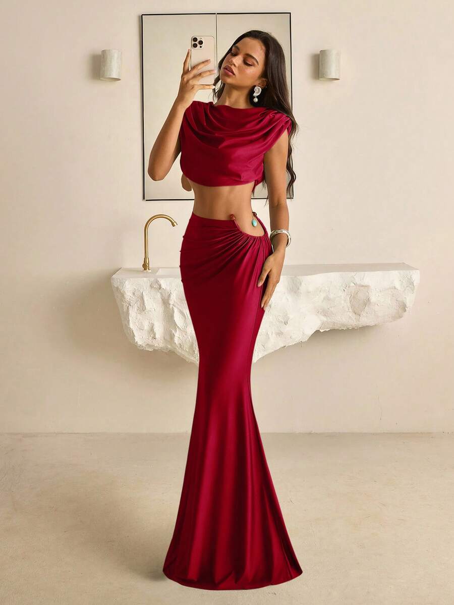 Burgundy cowl-neck crop top and mermaid maxi skirt