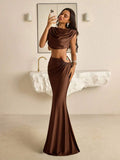 Brown cowl-neck crop top and fishtail maxi skirt set