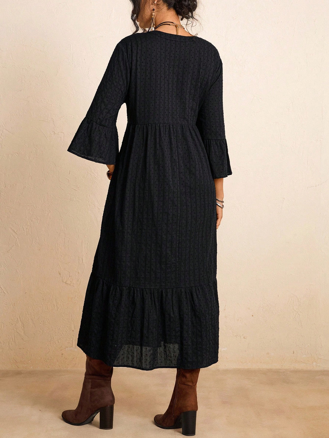 Elevate your seasonal wardrobe with this stunning plus-size dress that effortlessly blends sophistication with comfort. Crafted from quality woven fabric, it features intricate embroidery details that add visual interest and personality. The notched neckline offers a modern, flattering silhouette, while the mid-length cut provides versatile styling options for both casual outings and dressier occasions. Perfect for fall and winter layering, this piece transitions beautifully from day to night. Whether you'r