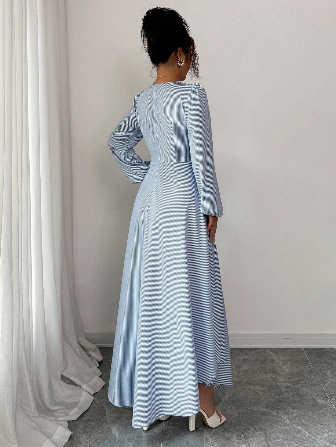 Turn heads with this playful chic striped dress featuring a ruched waist that flatters every curve and an asymmetric hem that adds a flirty twist. Perfect for effortless elegance, it blends bold stripes with a fun silhouette to keep you stylish and comfortable all day long. Whether you're out for brunch or a night on the town, this dress makes dressing up feel easy and exciting.