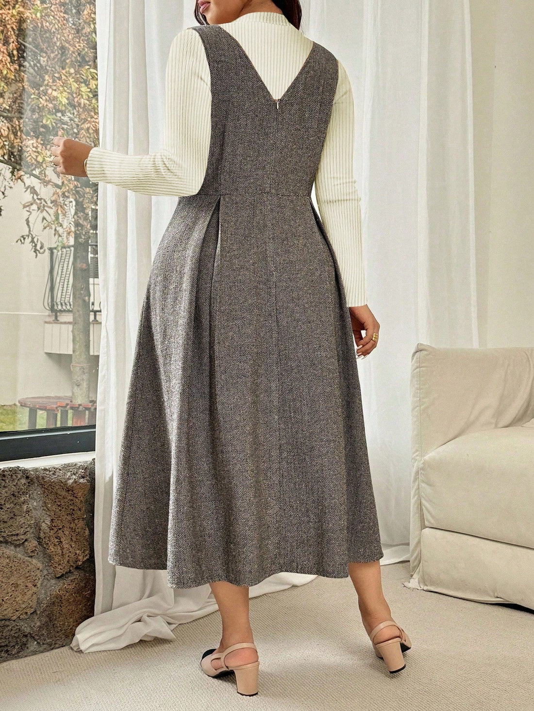 Step into cozy elegance with this Chic Plus Size Women's Herringbone Sleeveless Dress. Inspired by French casual charm, its timeless herringbone pattern pairs perfectly with autumn and winter layers. Whether you're strolling through crisp fall streets or sipping coffee in a cozy café, this dress offers effortless style and comfort made just for you. Embrace warmth, flair, and playful sophistication all season long!
