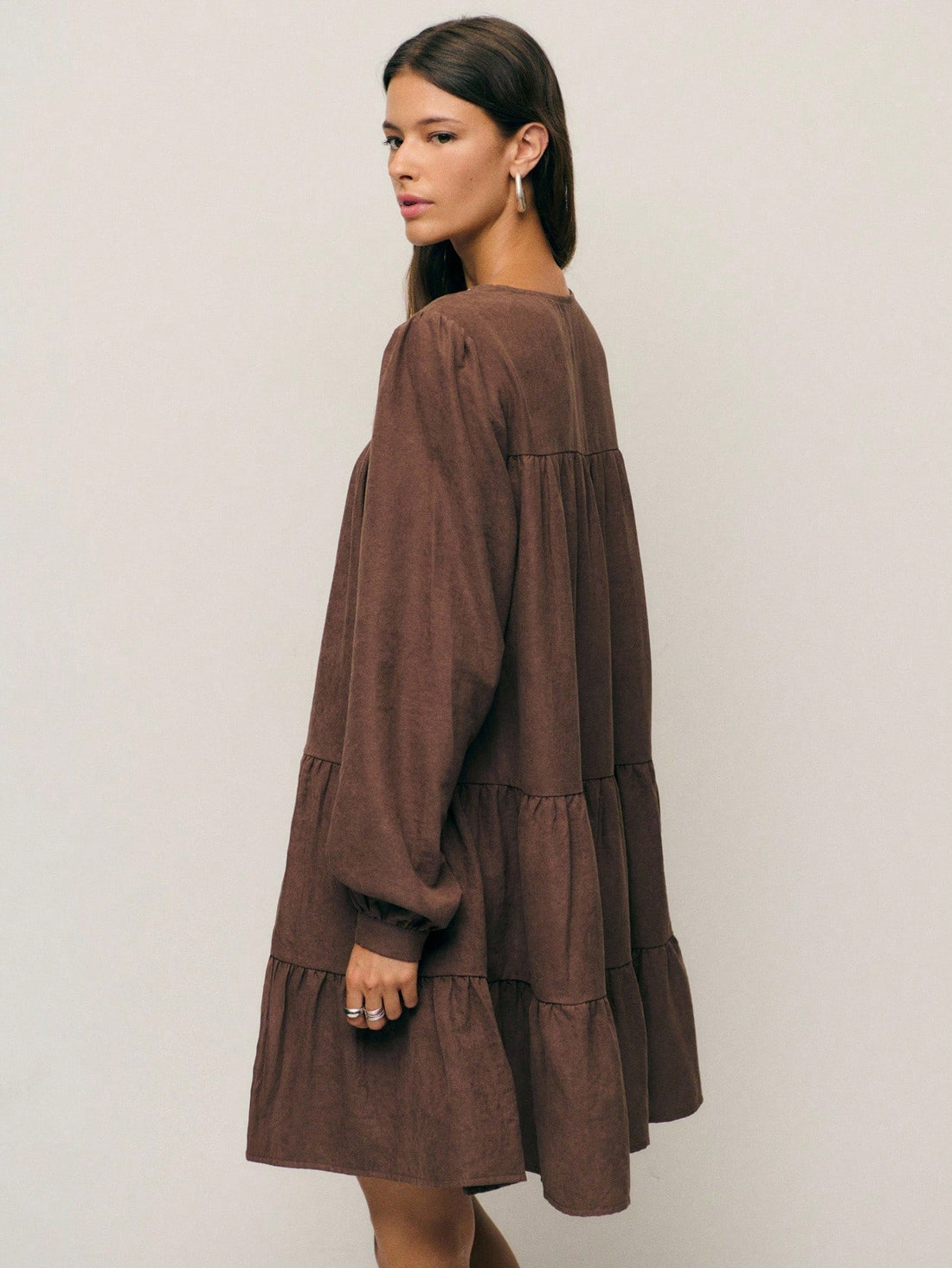 Twirl into autumn with this charming boho-inspired A-line dress that's equal parts whimsical and cozy. Adorned with delicate embroidery and playful tassels, it features an adjustable drawstring waist for the perfect fit. The relaxed silhouette flatters every frame while the earthy aesthetic captures that effortless fall vibe. Whether you're sipping cider at a pumpkin patch or strolling through crisp leaves, this dress brings bohemian flair to your seasonal wardrobe. Embrace the season in style and comfort.