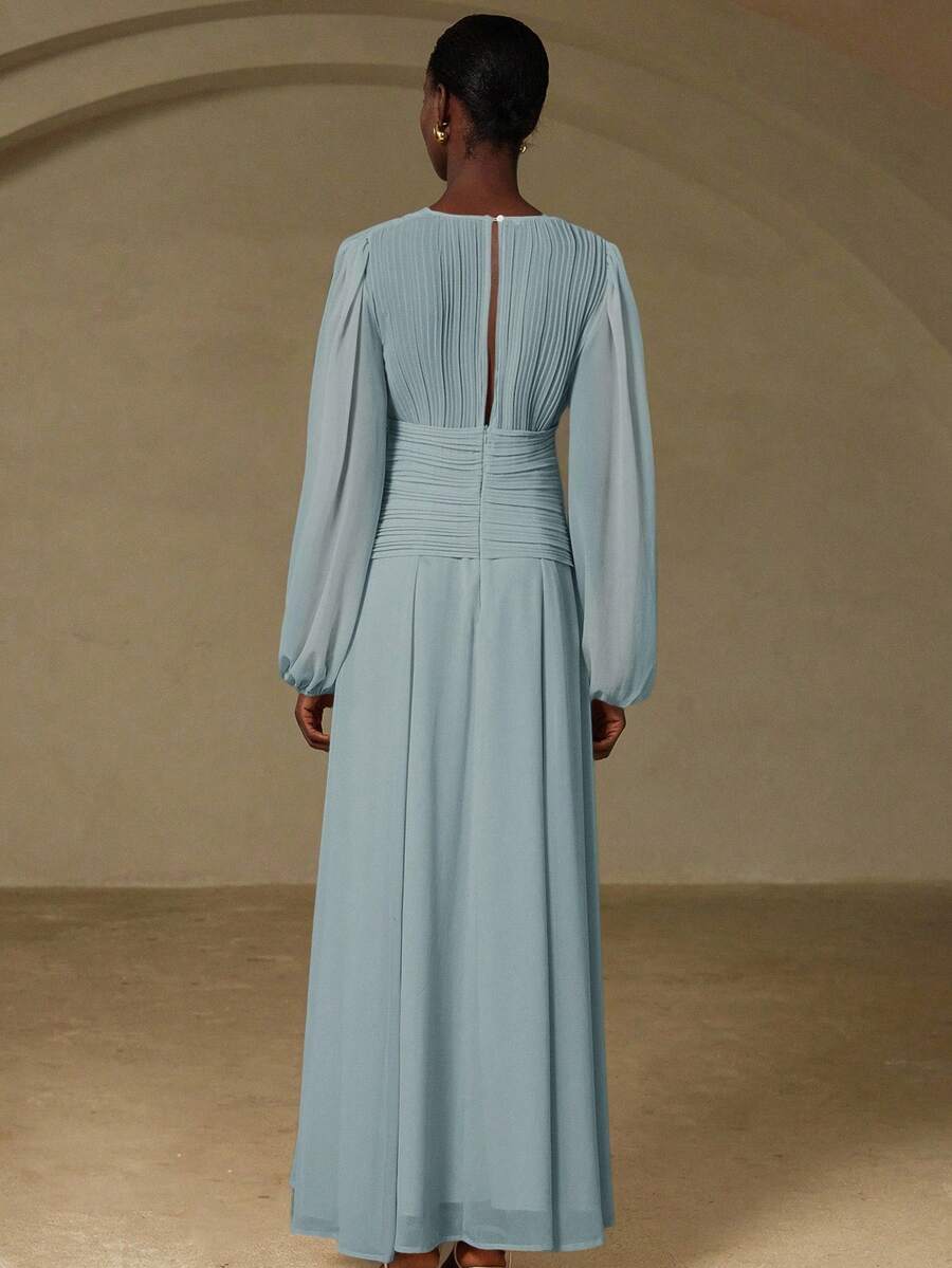 Bonjour, darling! Step into timeless Parisian elegance with this show-stopping maxi dress. The asymmetric drawstring waist cinches your silhouette with effortless chic, while delicate pleats add movement and dimension throughout. Crafted in the spirit of vintage French fashion, this piece whispers sophistication whether you're strolling through the city or turning heads at an evening soirée. Perfect for those who believe fashion should be both playful and polished. Oui, c'est magnifique!