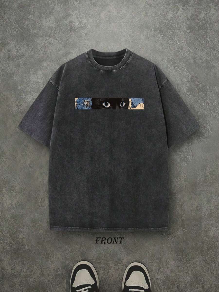 Front view of washed black cat floral graphic T-shirt with cat eyes and flower print