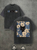 Front and back view of washed black cat floral graphic T-shirt with floral artwork