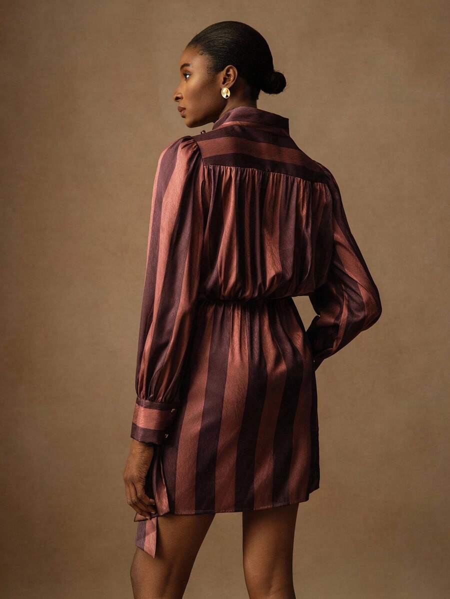 Elevate your wardrobe with this stunning mandarin collar dress that's equal parts chic and charming! The classic mandarin neckline adds an instant touch of sophistication, while the convenient clasp closure makes getting ready a breeze. Perfect for date nights, cocktail parties, or whenever you want to feel fabulous, this short dress flatters every figure and pairs beautifully with heels or flats. Whether you're heading to brunch with friends or a special evening out, this versatile piece is your new go-to 