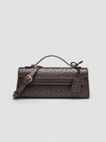 Ostrich embossed structured top handle shoulder bag with flap closure and adjustable strap
