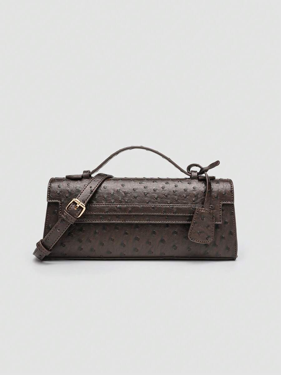Ostrich embossed structured top handle shoulder bag with flap closure and adjustable strap