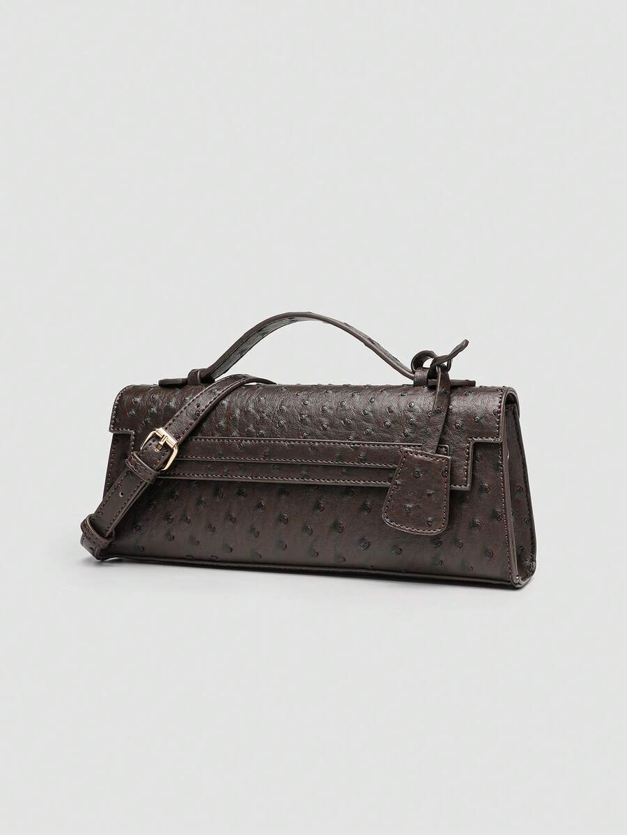 Ostrich embossed structured top handle shoulder bag with flap closure and adjustable strap