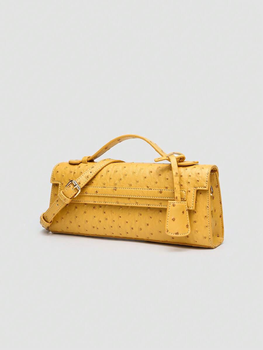 Ostrich embossed structured top handle shoulder bag with flap closure and adjustable strap