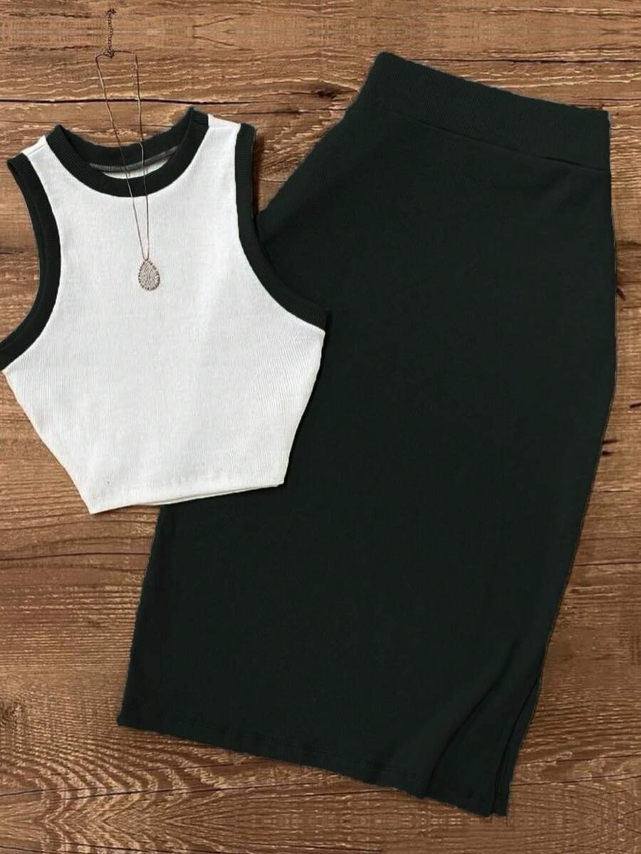 Elevate your wardrobe with this stunning 2-piece vintage resort set. The elegant camisole features a classic round neckline with contrast binding, paired with a flowing maxi skirt for effortless sophistication. Crafted from quality polyester with slight stretch for comfort, this versatile ensemble transitions seamlessly from garden gatherings to office settings and evening outings. The slim-fit silhouette flatters your figure while the timeless white and black colorway complements any occasion. 