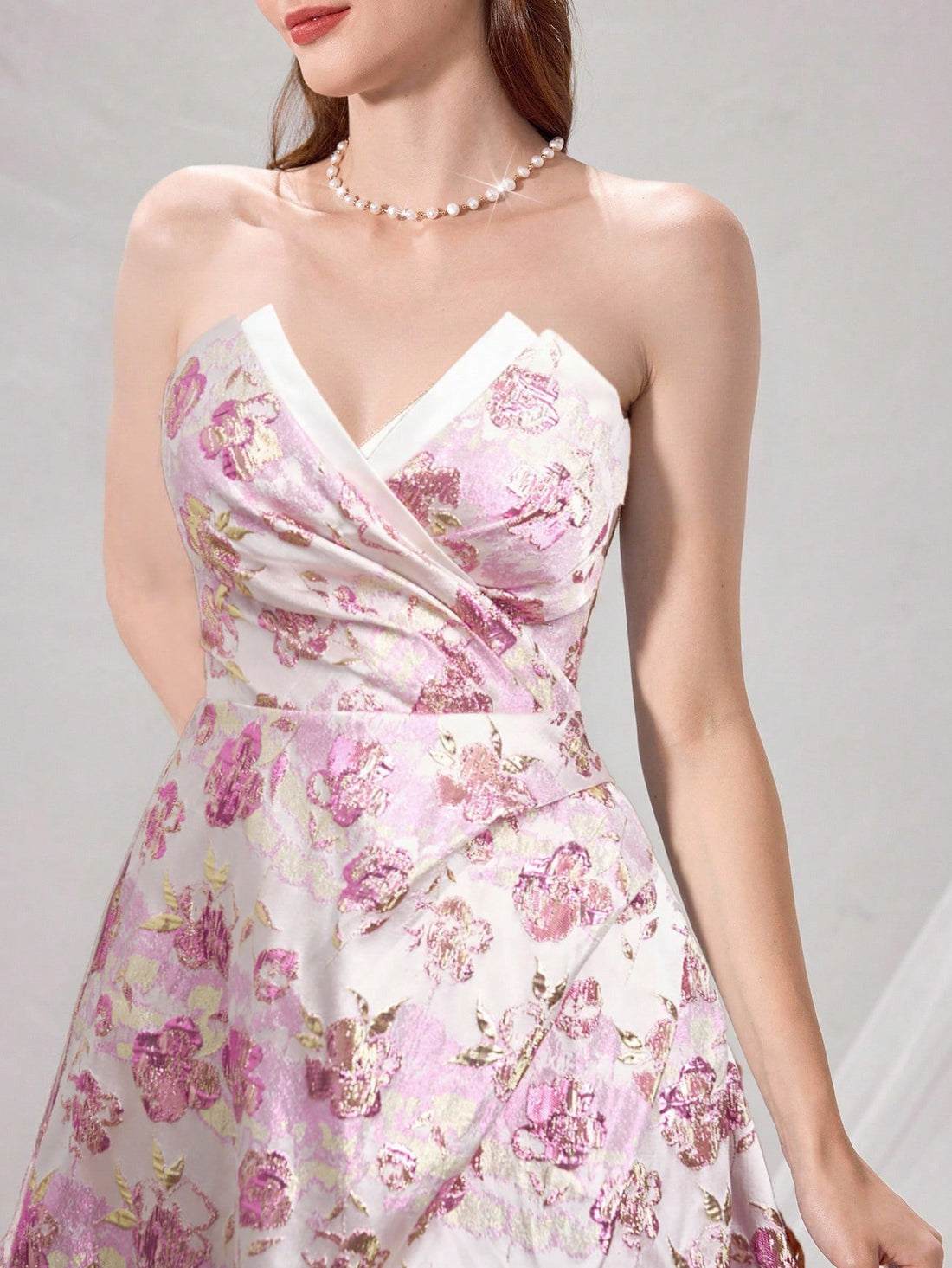 Step into the spotlight in this stunning pink jacquard evening dress that's pure magic! The strapless design shows off your shoulders while delicate pleats add graceful movement. Shimmering sequins and intricate lace details catch every light, making you the star of any formal event. Whether it's a gala, wedding, or special celebration, this dress combines elegance with just enough sparkle to keep things fun and fabulous. You'll feel absolutely radiant!