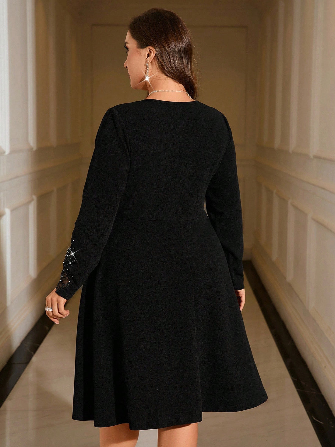 Step into the spotlight with this playful plus-size black lace dress, designed to flatter and dazzle at every fall party. Delicate patchwork lace adds a touch of romance, while sparkling rhinestone details catch the light just right. Perfect for twirling, mingling, and making unforgettable memories this season.