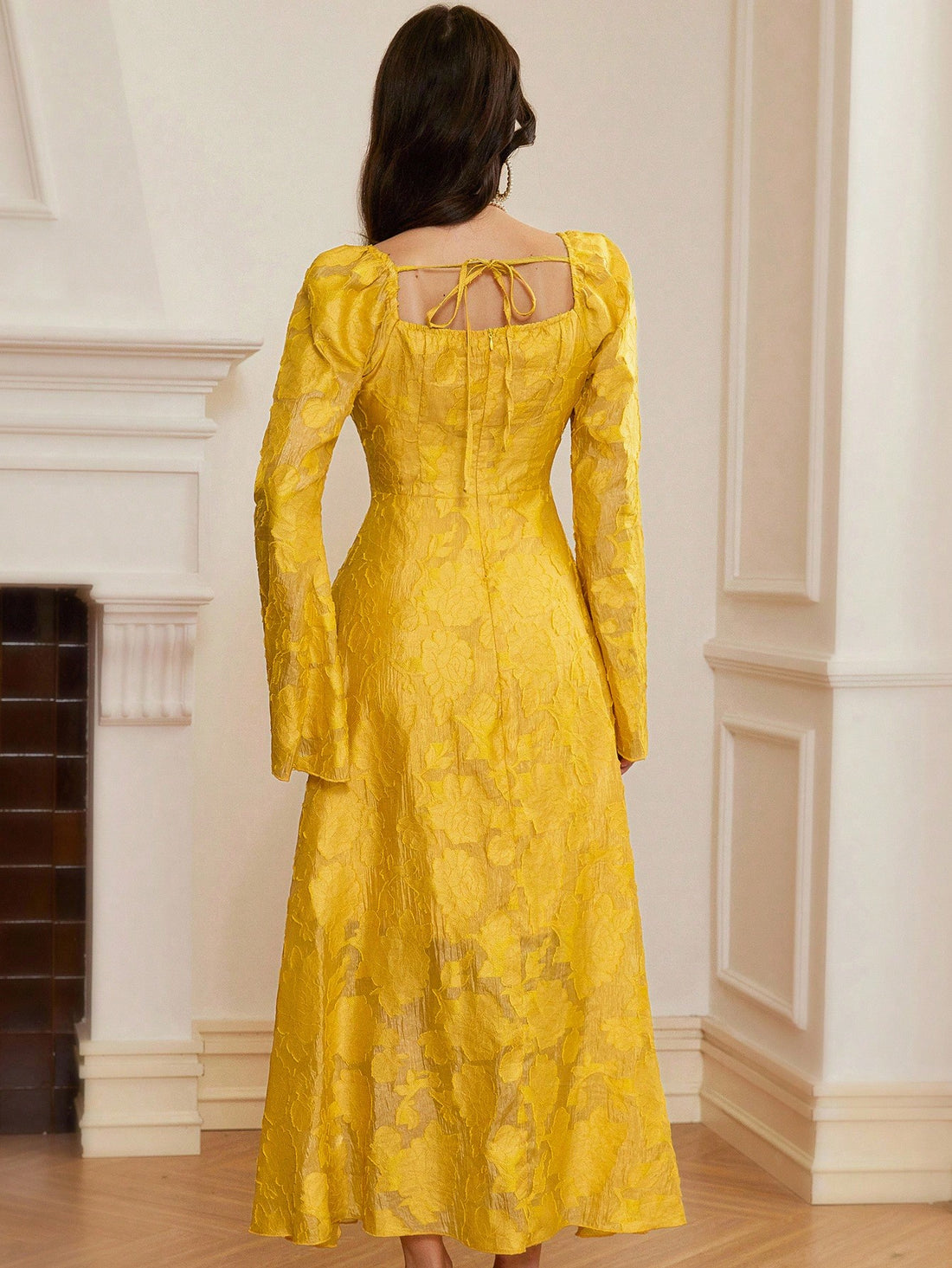 Step into fall with a splash of sunshine! This elegant yellow jacquard dress features long sleeves and a charming cutout detail that adds a flirty touch. Perfect for cozy autumn evenings or romantic daytime outings, its rich texture and playful design make it a standout piece in any wardrobe. Brighten your look and embrace the season with effortless style and a hint of whimsy.