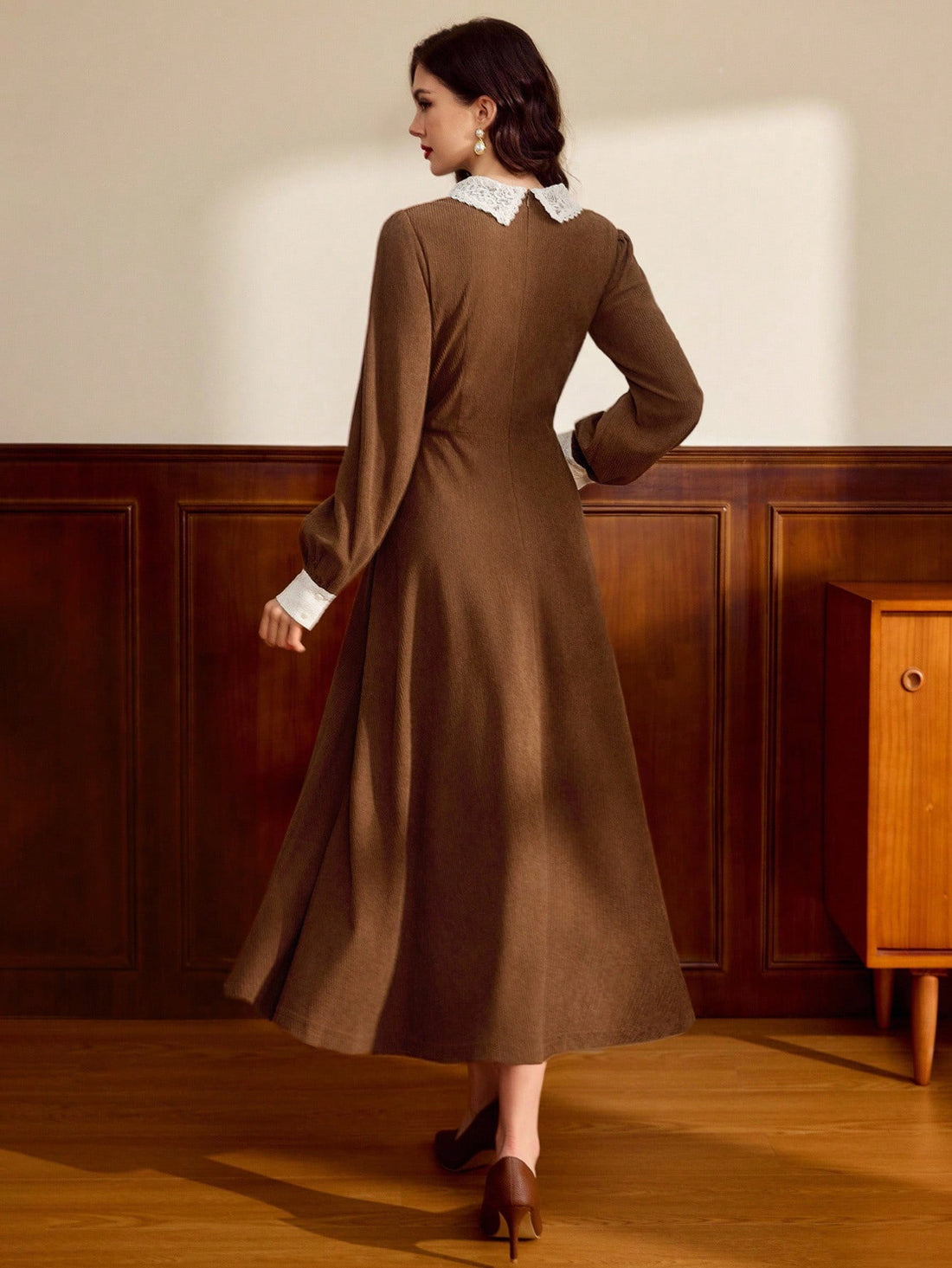 Step into cozy charm with this Elegant Vintage Long Sleeve Patchwork Dress in warm coffee brown. Perfect for autumn and winter, its unique patchwork design adds a dash of retro flair while keeping you snug and stylish. Whether you're strolling through colorful leaves or enjoying a hot cocoa date, this dress blends comfort with playful vintage vibes effortlessly.