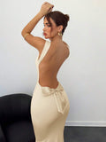 Cream backless bow cowl neck maxi dress front view