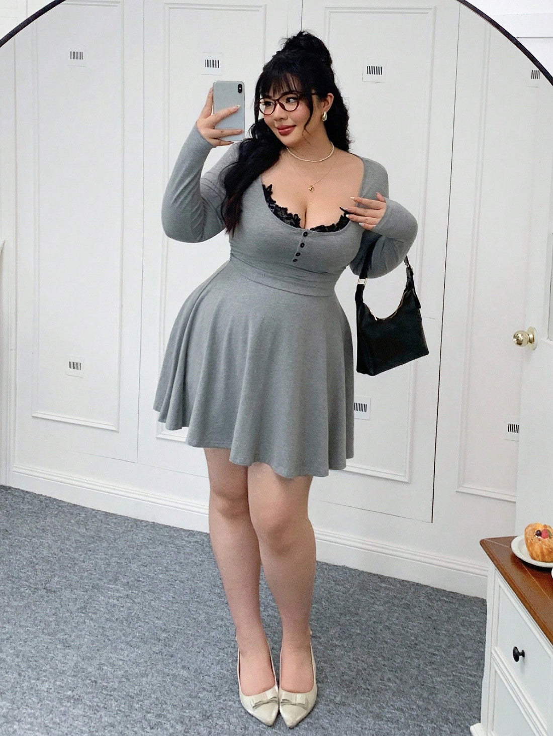 Embrace the season in style with this stunning plus-size dress that's equal parts elegant and fun! The flattering A-line silhouette skims beautifully over curves, while the V-neckline adds a touch of sophistication. Long sleeves keep you cozy through chilly autumn and winter days, and the delicate lace contrast detailing brings an unexpected playful twist. Perfect for everything from casual outings to special occasions, this dress proves that comfort and fashion are absolutely meant to be together. Dress it